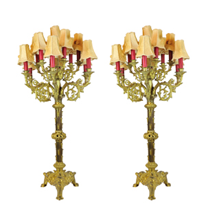 Empire styled gilt brass candelabra, France, mid to late 19th century. Estimate: $2,500-$4,500. Image courtesy of Morton Kuehnert Auctioneers & Appraisers.